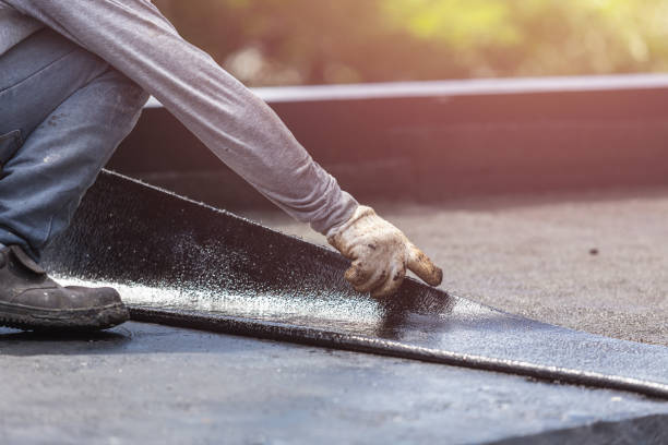 Professional Basement Waterproofing technician working in Lancaster, NY
